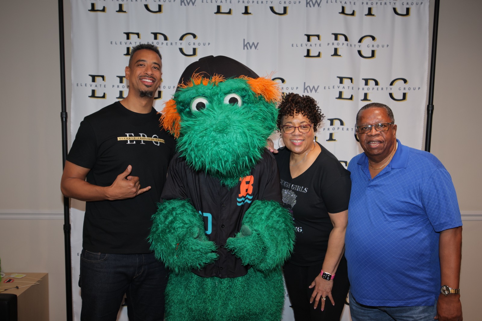 Elevate Property Group guests with the team mascot