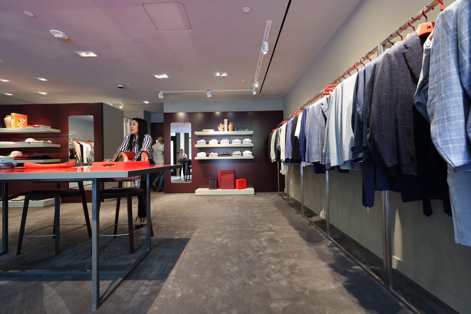 Isaia store floor and tailoring table