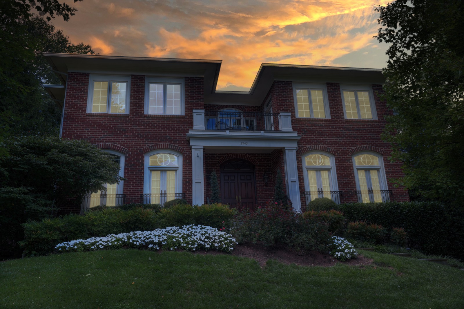 Brick colonial at twilight