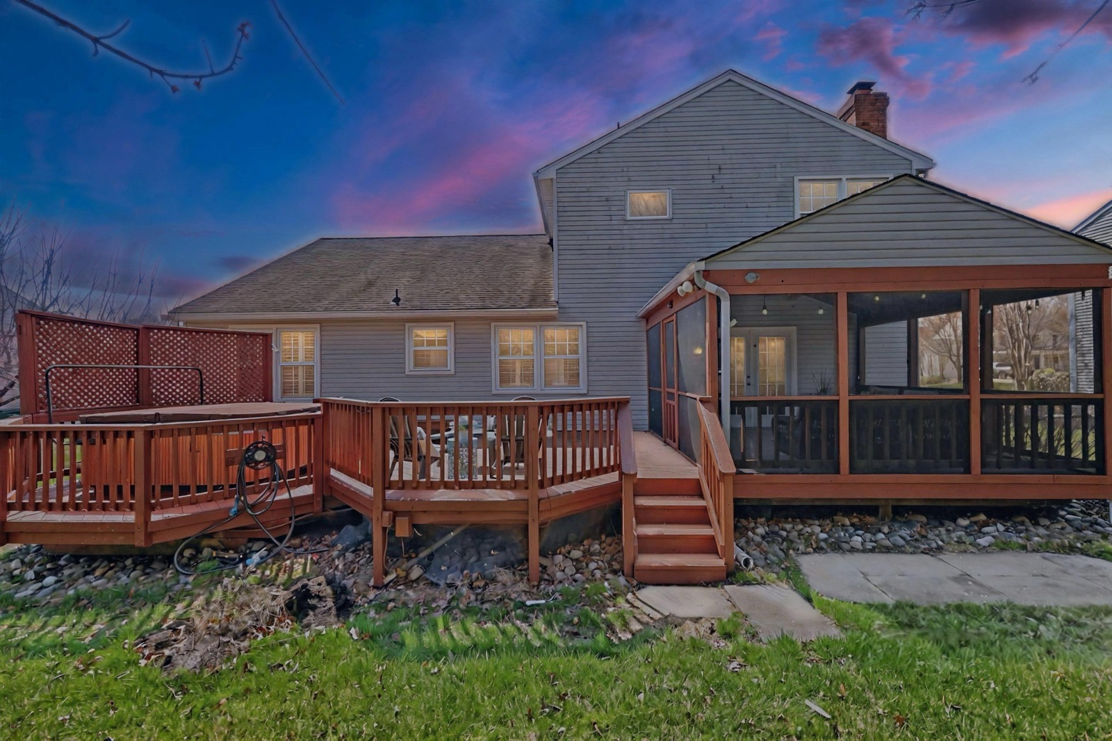 Twilight exterior with deck, 13521 Granite Rock Dr